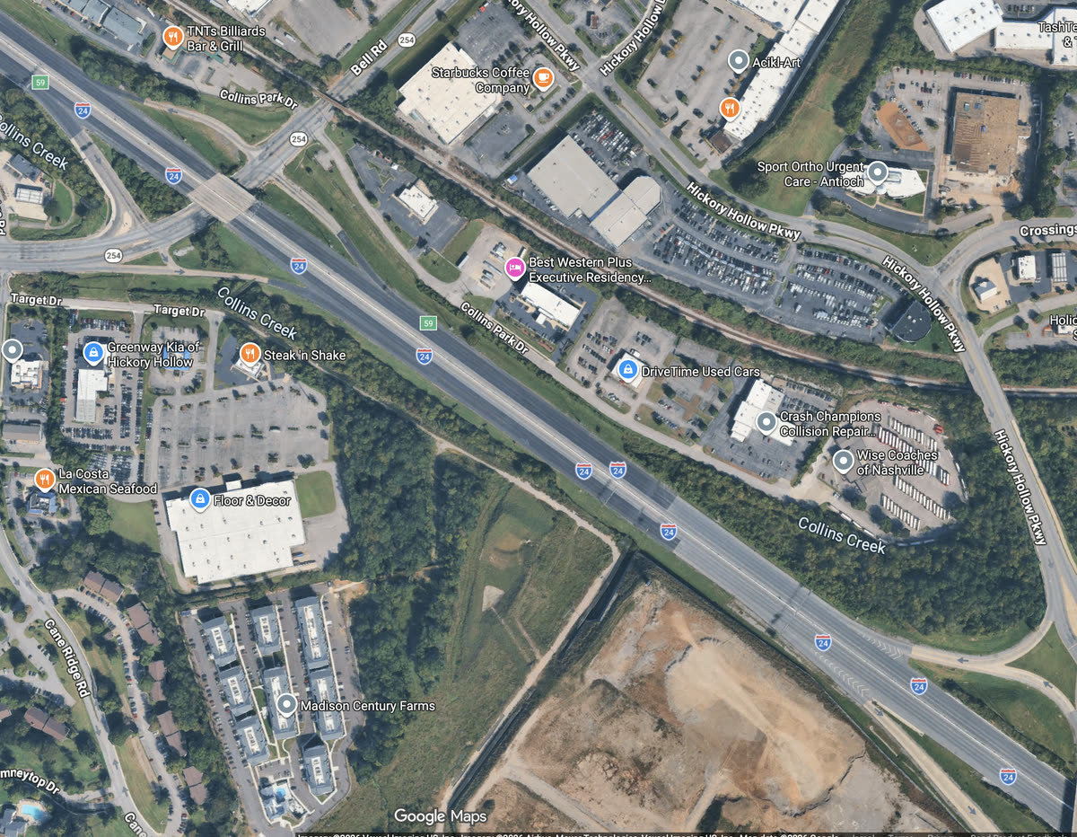 Satellite view of the simulated 2 km stretch of I-24 with a single on-ramp